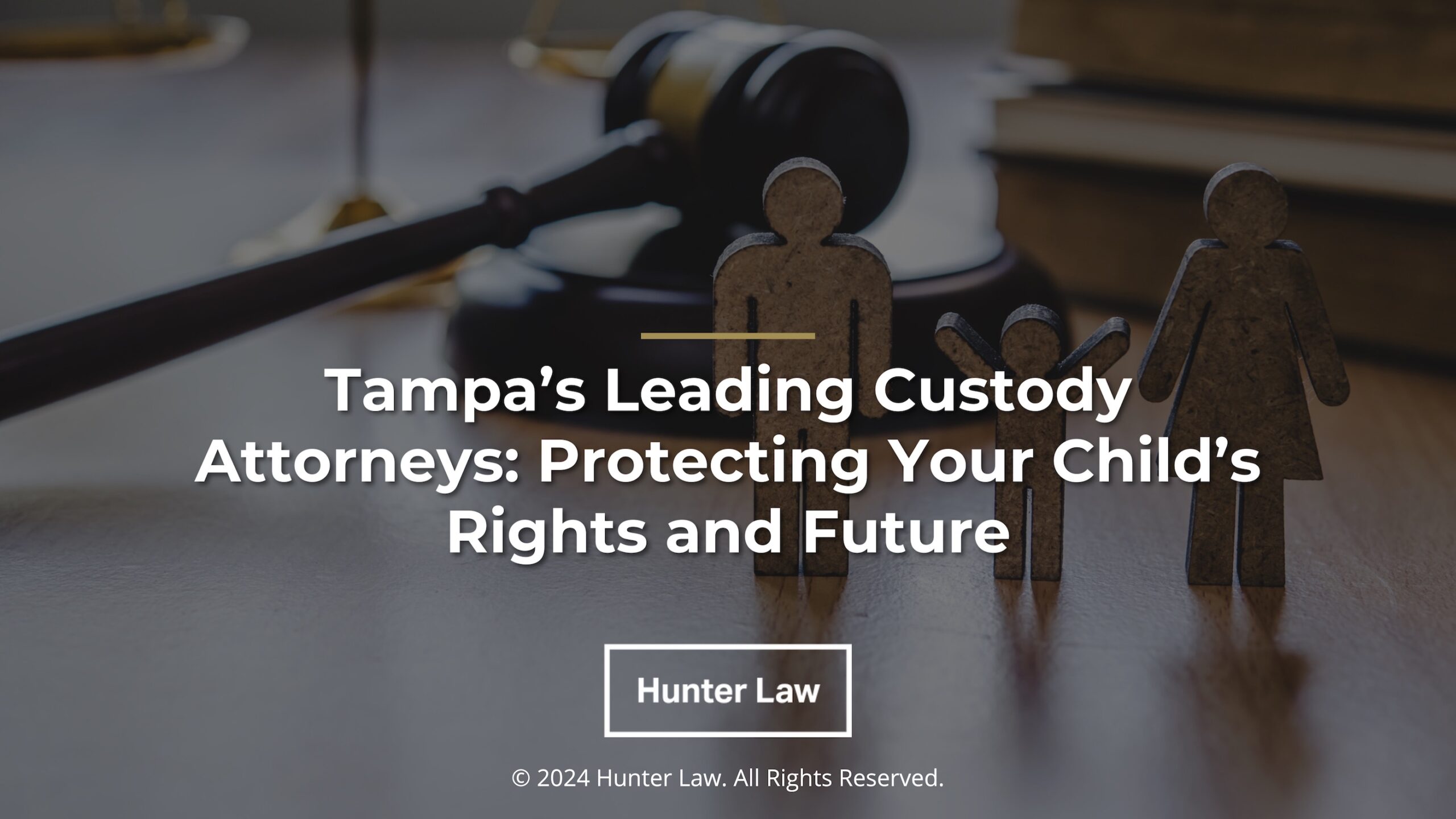 Featured: family law concept, judges gavel on desk, law books, wooden family- Tampa's leading custody attorney: protecting your child's rights and future