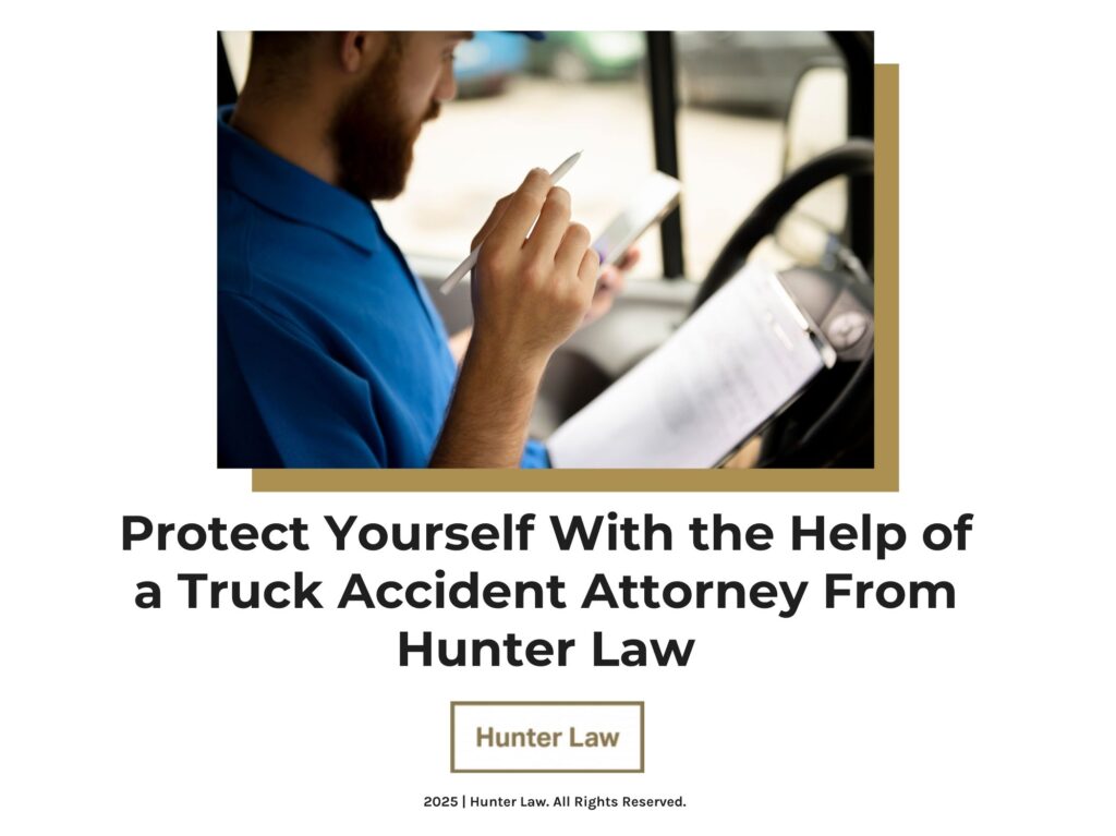 Truck driver in blue shirt checking paperwork in truck- Protect Yourself with the Help of a Truck Accident Attorney From Hunter Law. 